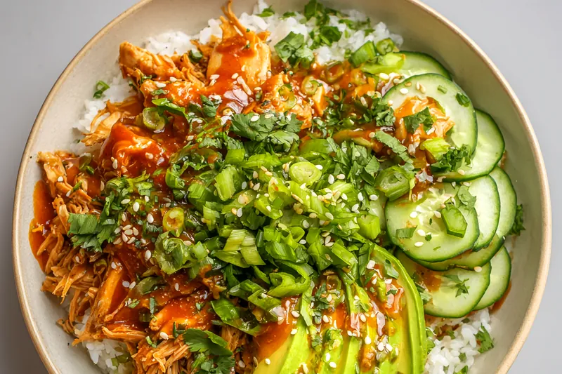 A colorful assortment of fresh ingredients for the Bang Bang Chicken Bowl.