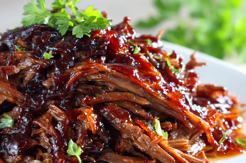 Ingredients for caramelized pulled beef brisket laid out on a counter