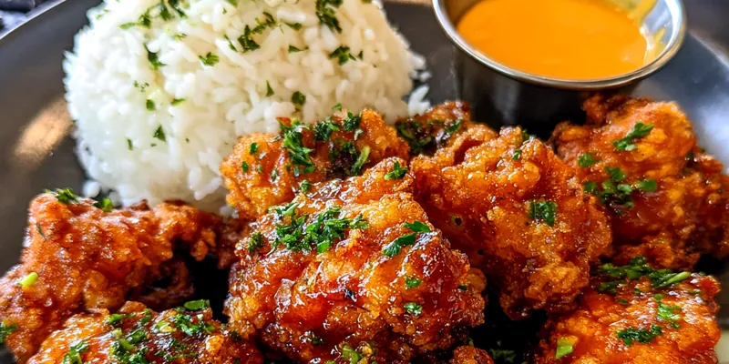 Delicious Crispy Bang Bang Chicken served on a plate
