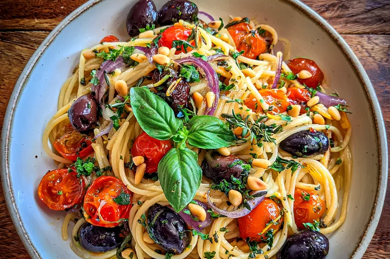 A step-by-step process of cooking Easy Mediterranean Pasta Delight showing sautéing, mixing, and final plating.