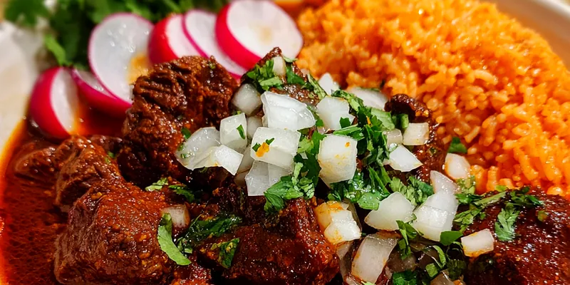 Delicious Rich Beef Stew with Rice served on a plate