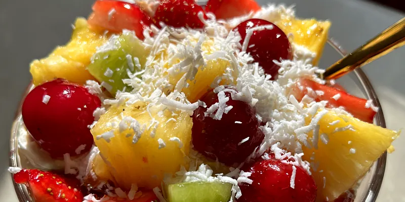 Delicious Tropical Fruit Cream Delight served on a plate